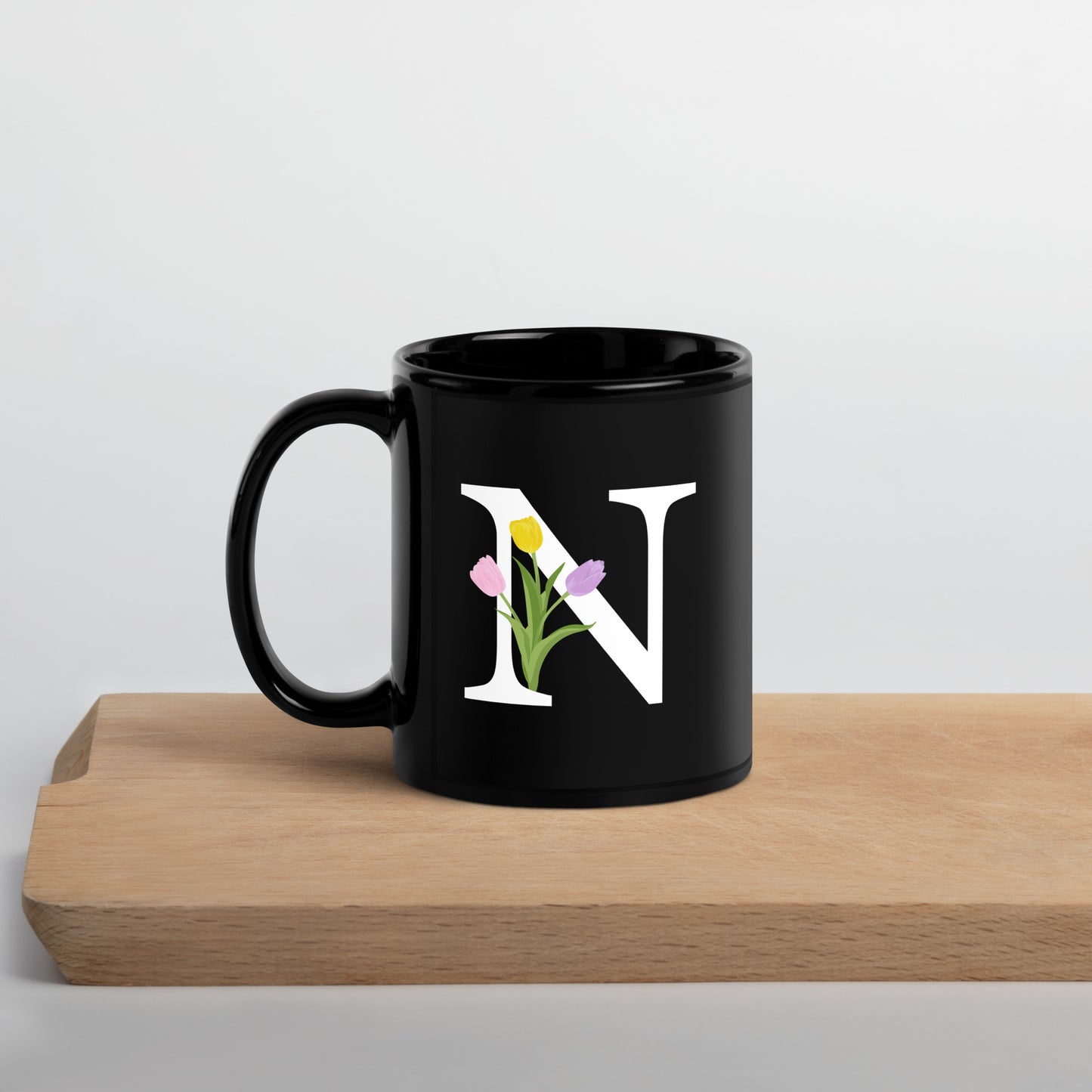 Stylish Glossy Ceramic Mug with Minimalist Initial 'N' with Tulips motif